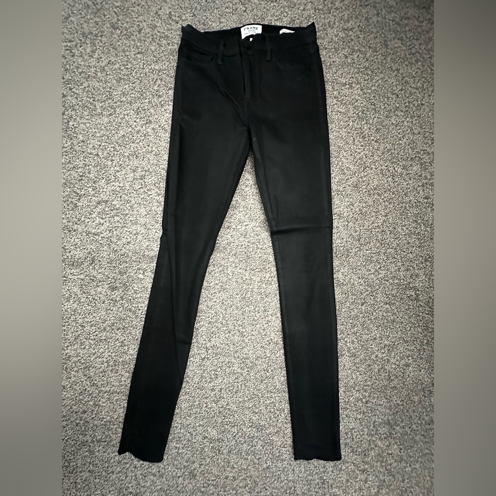 Frame extra long black coated denim jeans. Size 28